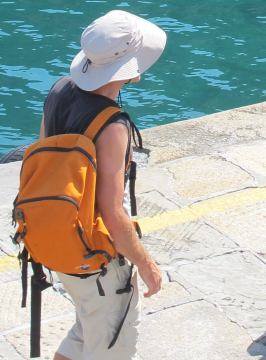 draag een hoed op het strand